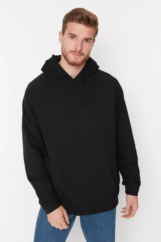 Svart basic huvtröja i oversize/bred passform med fleecefoder